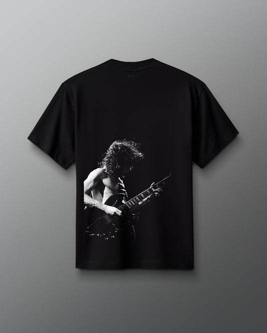 Black t-shirt with a graphic of ACDC Band person playing guitar on a gray background