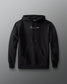 Black hoodie with a brand logo on a gray background