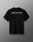 Black t-shirt with 'A WAY OF LIFE' text on a gray background