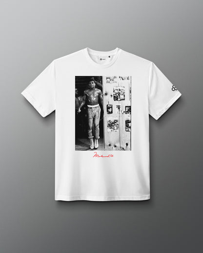 RUDIS Ali The Greatest Elite Supersoft T-Shirt in white, featuring a black-and-white Muhammad Ali training image, red signature detail, and RUDIS Hex sleeve branding.