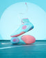 Pair of turquoise and pink high-top shoes on a blue background