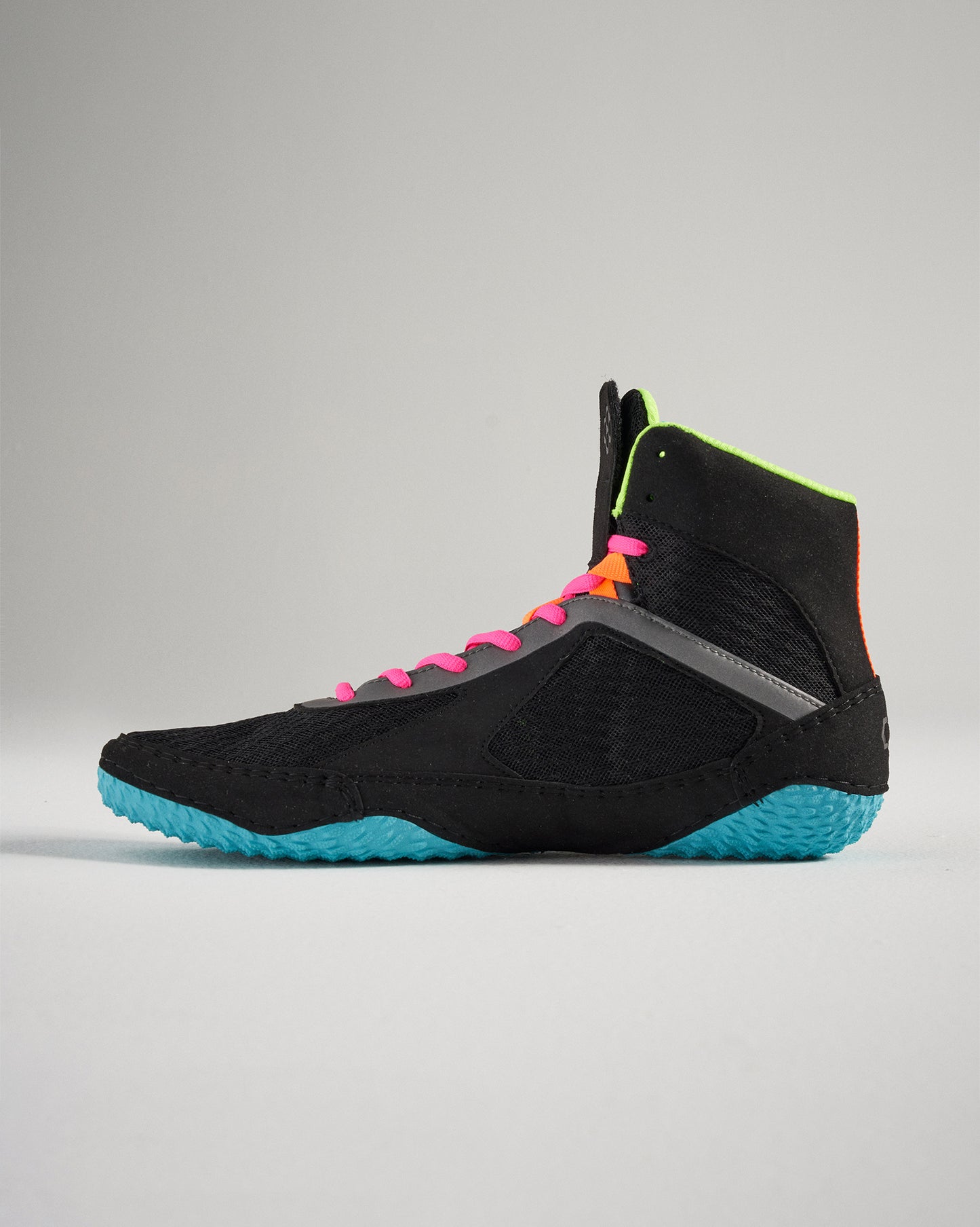 A stylish black athletic shoe with vibrant pink laces and a bright blue sole designed for both performance and aesthetics