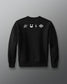 Black sweatshirt with white graphics on a gray background