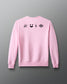 Pink sweatshirt with black graphics on a gray background