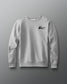 Gray sweatshirt with a Kolat logo on a gray background
