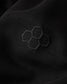 Black fabric with embroidered hexagonal pattern