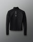 Black long-sleeve shirt with brand logo on a gray background