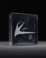 Box with a wrestling shoe and 'RUDIS' brand logo on a black background - Cary Kolat wrestling shoes