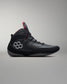 Black wrestling shoe with a unique logo on a gray background - Cary Kolat wrestling shoes