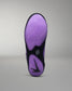 Purple and black wrestling shoe sole on a gray background