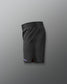 Black athletic shorts on a gray background