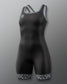 A black one-piece athletic wrestling singlet with gray trim on the straps and neckline, featuring a small mint green logo on the left chest and a black-and-white patterned hem at the legs, shown against a gray gradient background.