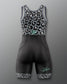 A women's athletic one-piece wrestling singlet with a gray and black leopard print bodice and matching patterned leg cuffs, paired with a solid black ribbed lower body. The brand name 'Sarah Hildebrandt' is printed in teal script on the left leg.