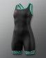 A black one-piece athletic bodysuit or wrestling singlet with teal trim along the scoop neck and leg cuffs, featuring a small pink geometric logo on the upper left chest and a teal leopard print pattern on the lower leg cuffs, shown against a neutral gray background.