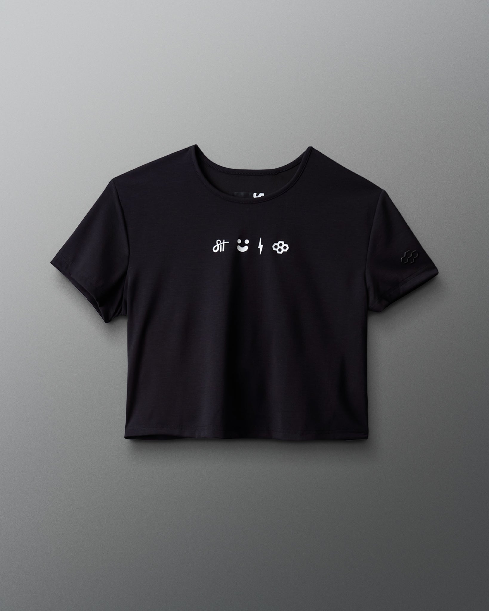 Black t-shirt with white text and symbols on a gray background