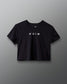 Black t-shirt with white text and symbols on a gray background