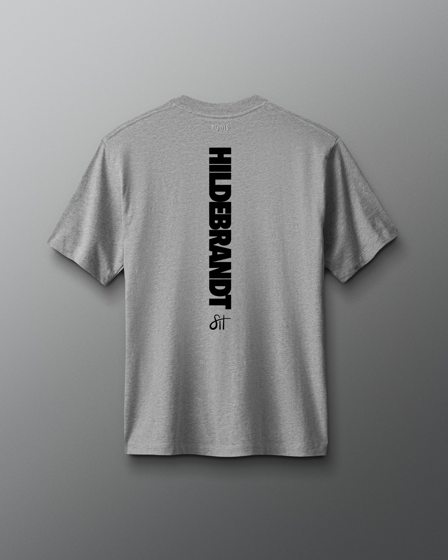 Gray t-shirt with 'HILDEBRANDT' logo on the back against a gray background