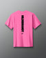 Pink t-shirt with 'HILDEBRANDT' logo on the back against a gray background