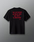 Black t-shirt with red text on a gray background