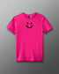 Pink t-shirt with a smiley face design on a gray background