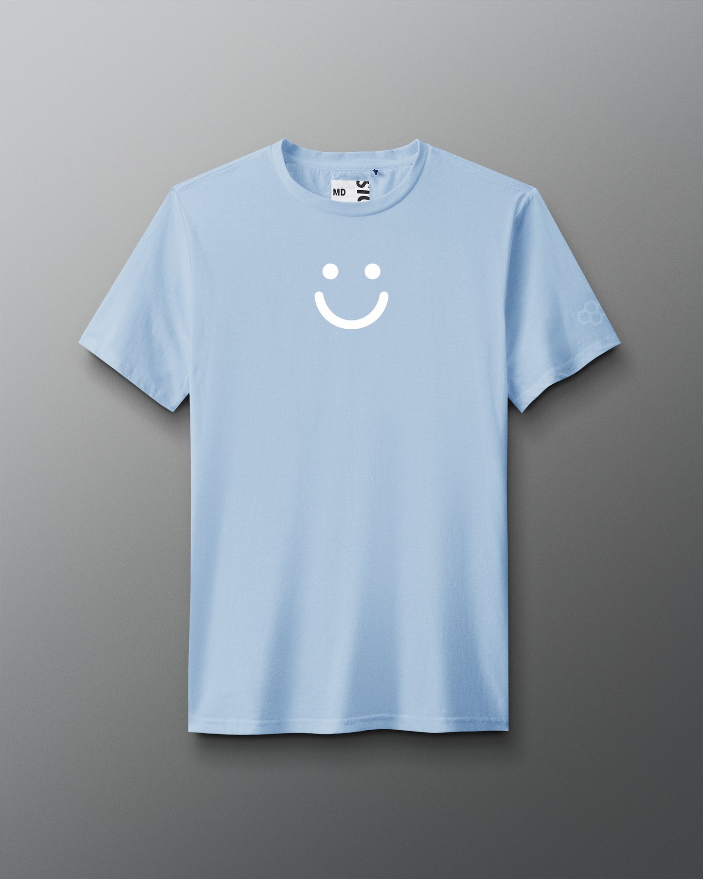 Light blue t-shirt with a white smiley face design on a gray background