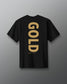 Back view of the black RUDIS JB Gold Heavyweight T-Shirt featuring oversized vertical gold “GOLD” lettering with Jordan Burroughs and RUDIS details beneath the graphic.