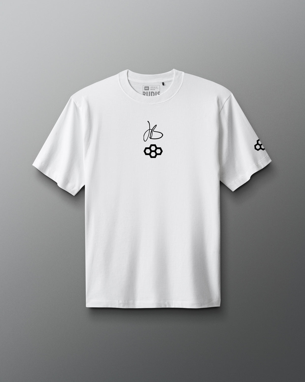 White RUDIS JB Gold Heavyweight T-Shirt shown from the front, featuring Jordan Burroughs’ signature above the RUDIS mark on the chest and a RUDIS logo graphic on the sleeve.