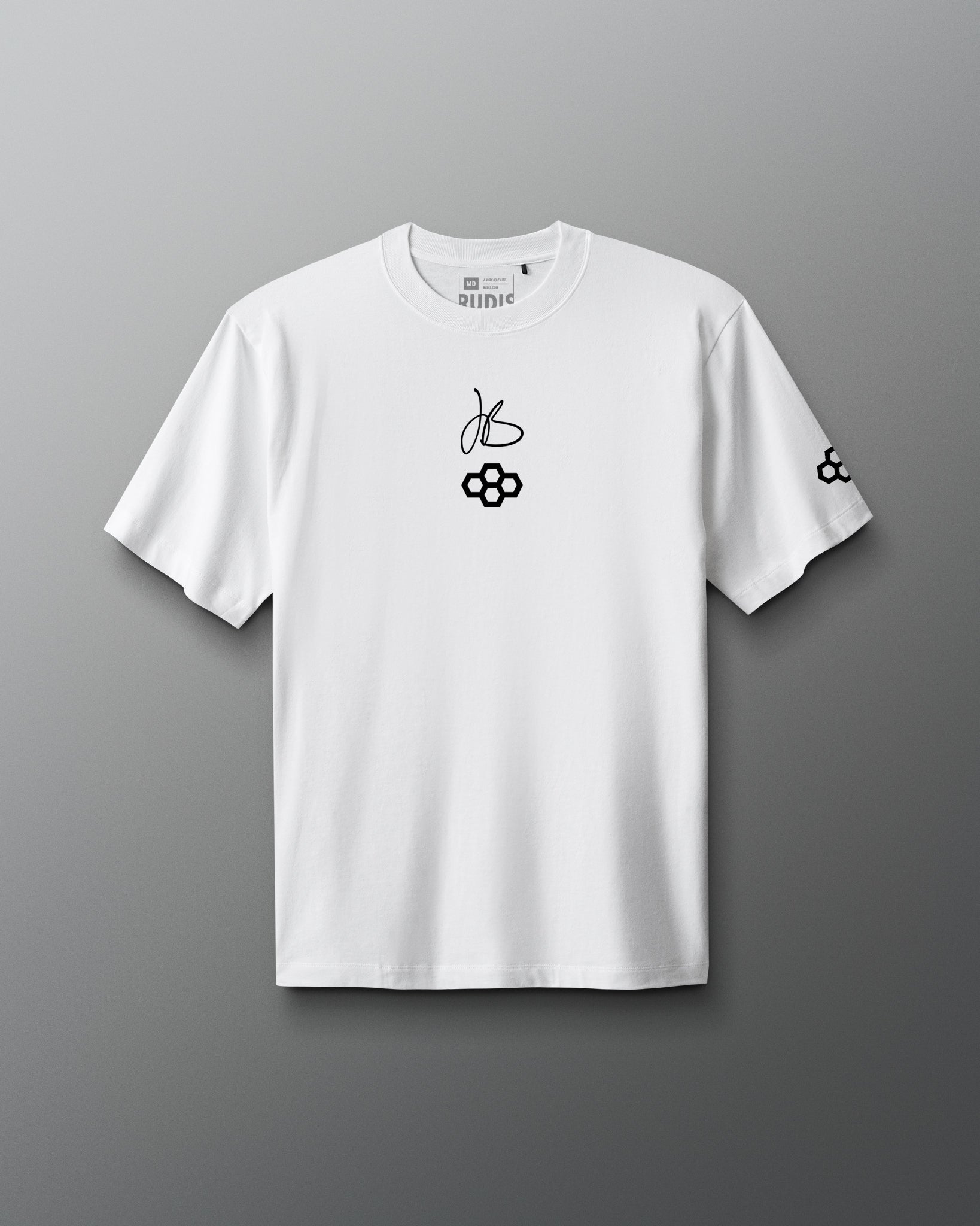White RUDIS JB Gold Heavyweight T-Shirt shown from the front, featuring Jordan Burroughs’ signature above the RUDIS mark on the chest and a RUDIS logo graphic on the sleeve.