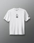 White RUDIS JB Gold Heavyweight T-Shirt shown from the front, featuring Jordan Burroughs’ signature above the RUDIS mark on the chest and a RUDIS logo graphic on the sleeve.