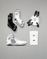Collection of black and white wrestling gear including shoes, socks, and kneepads on a gray background.