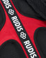 Red and black protective gear with 'RUDIS' branding on a strap.