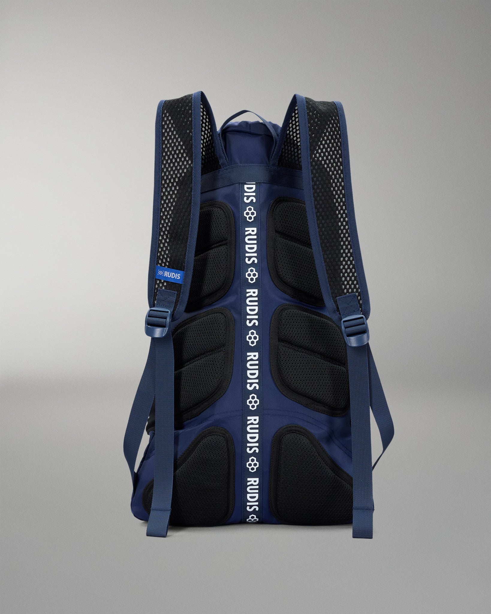Blue and black backpack with visible branding on a gray background