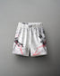 White wrestling shorts with RUDIS hex logo and 'BloodSport' word mark on side