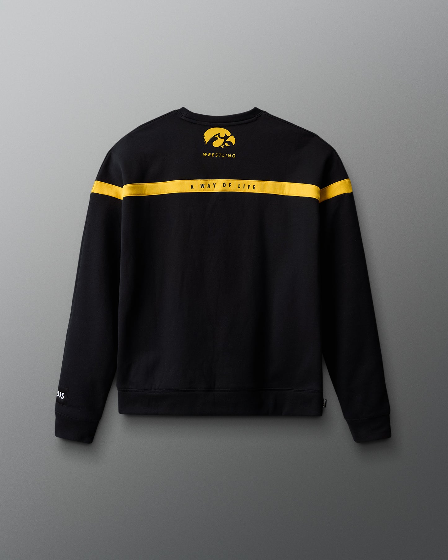 Black sweatshirt with yellow accents on a gray background