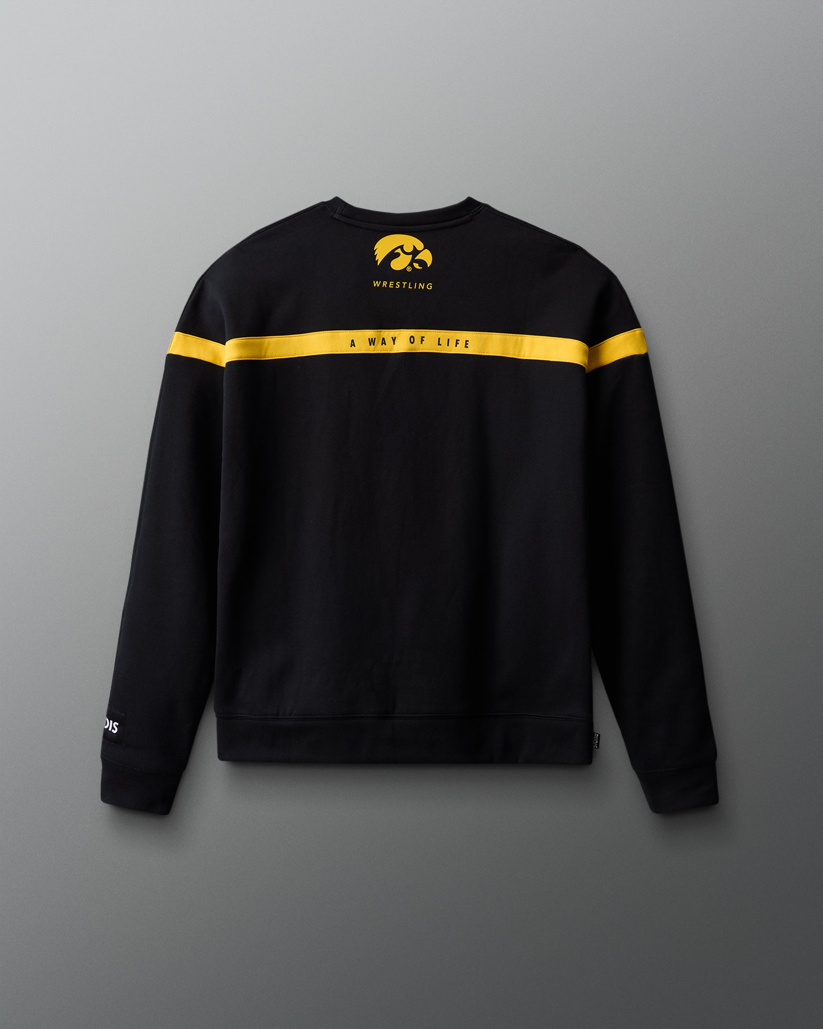 Black sweatshirt with yellow accents on a gray background