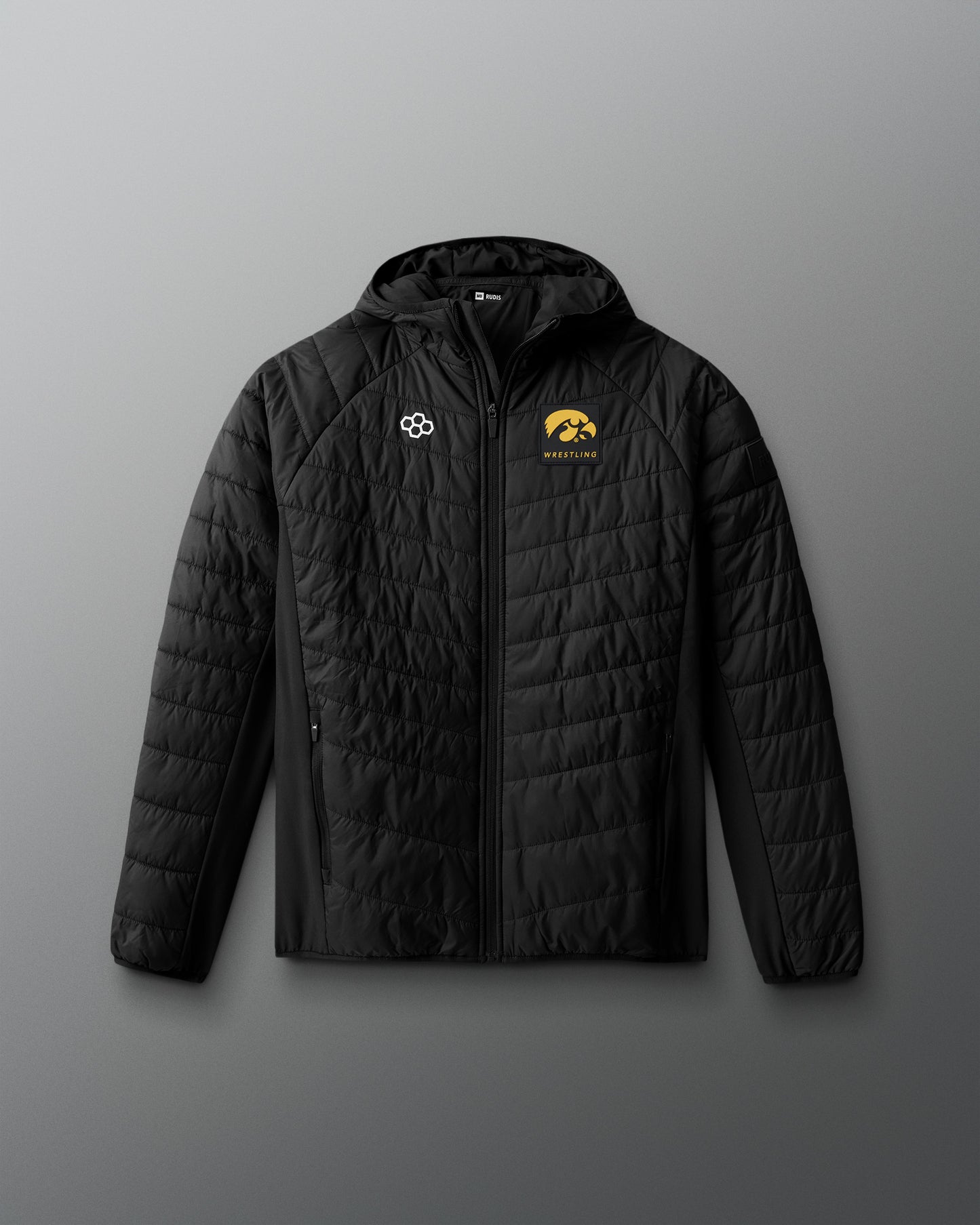 Black quilted jacket with logos on a gray background