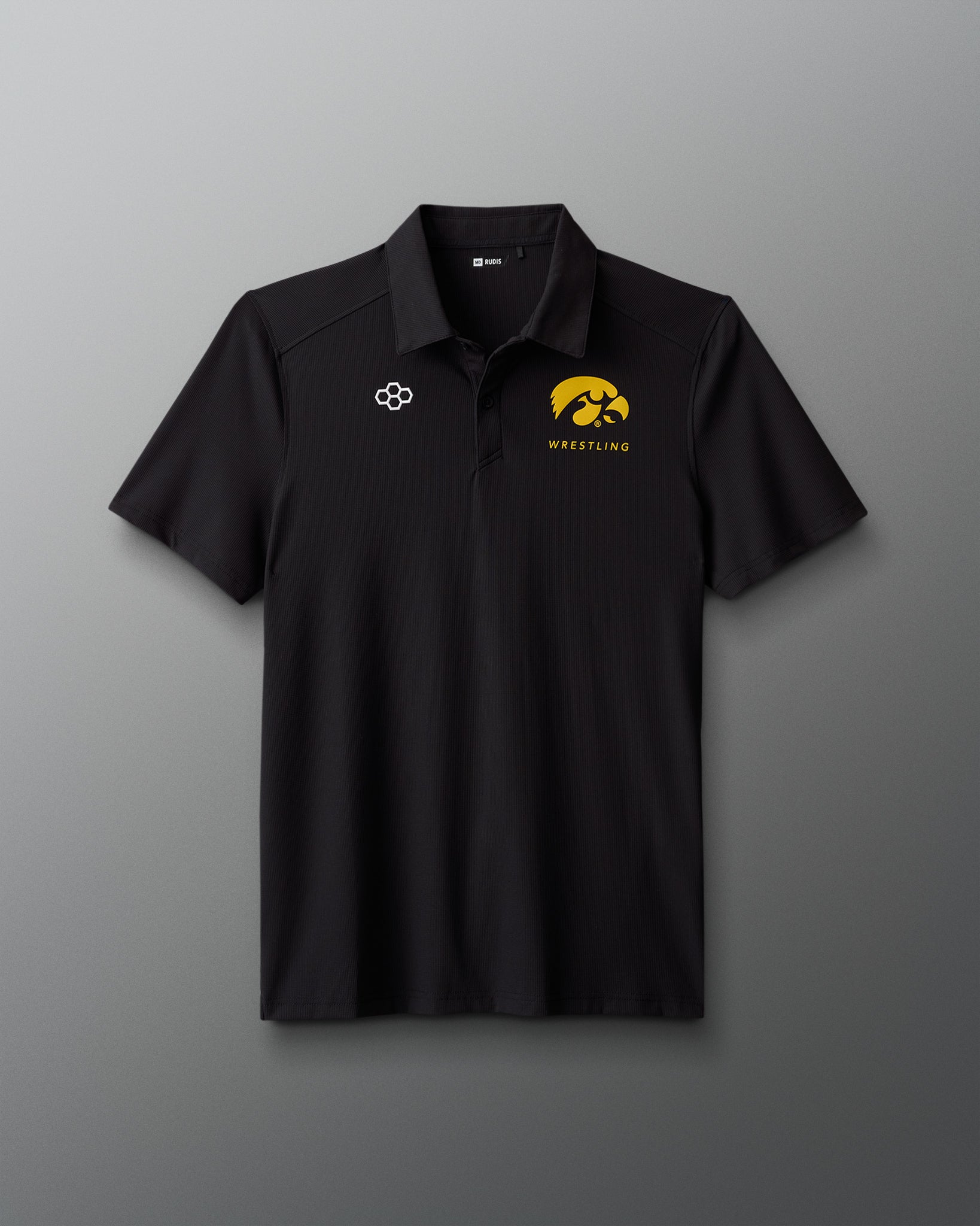 Black polo shirt with wrestling logo on a gray background