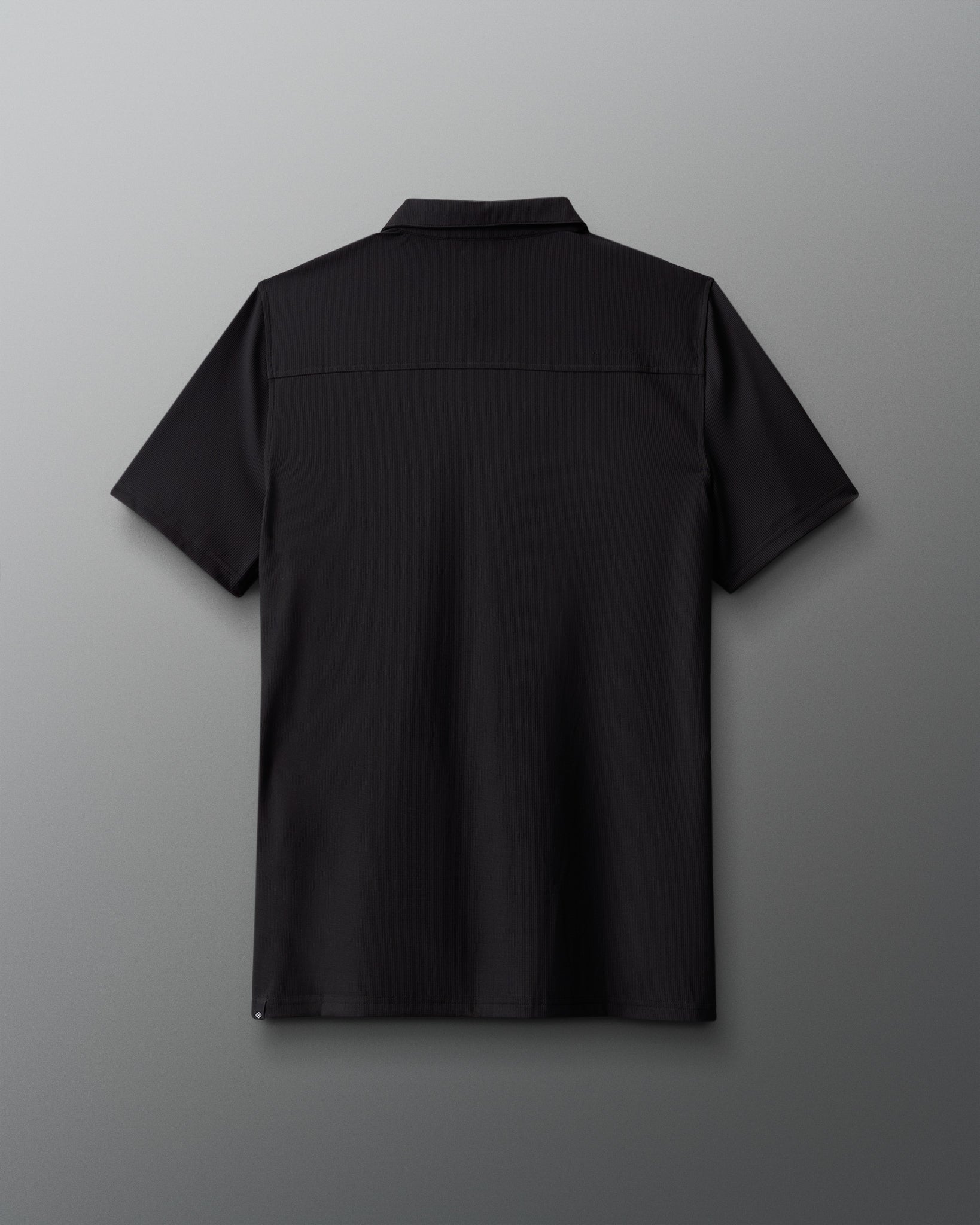Black shirt on a gray background
