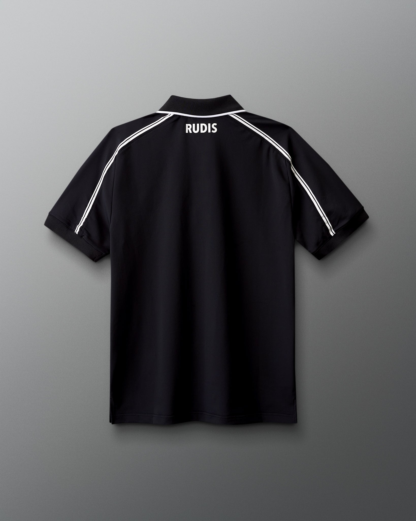 Black polo shirt with 'RUDIS' branding on a gray background