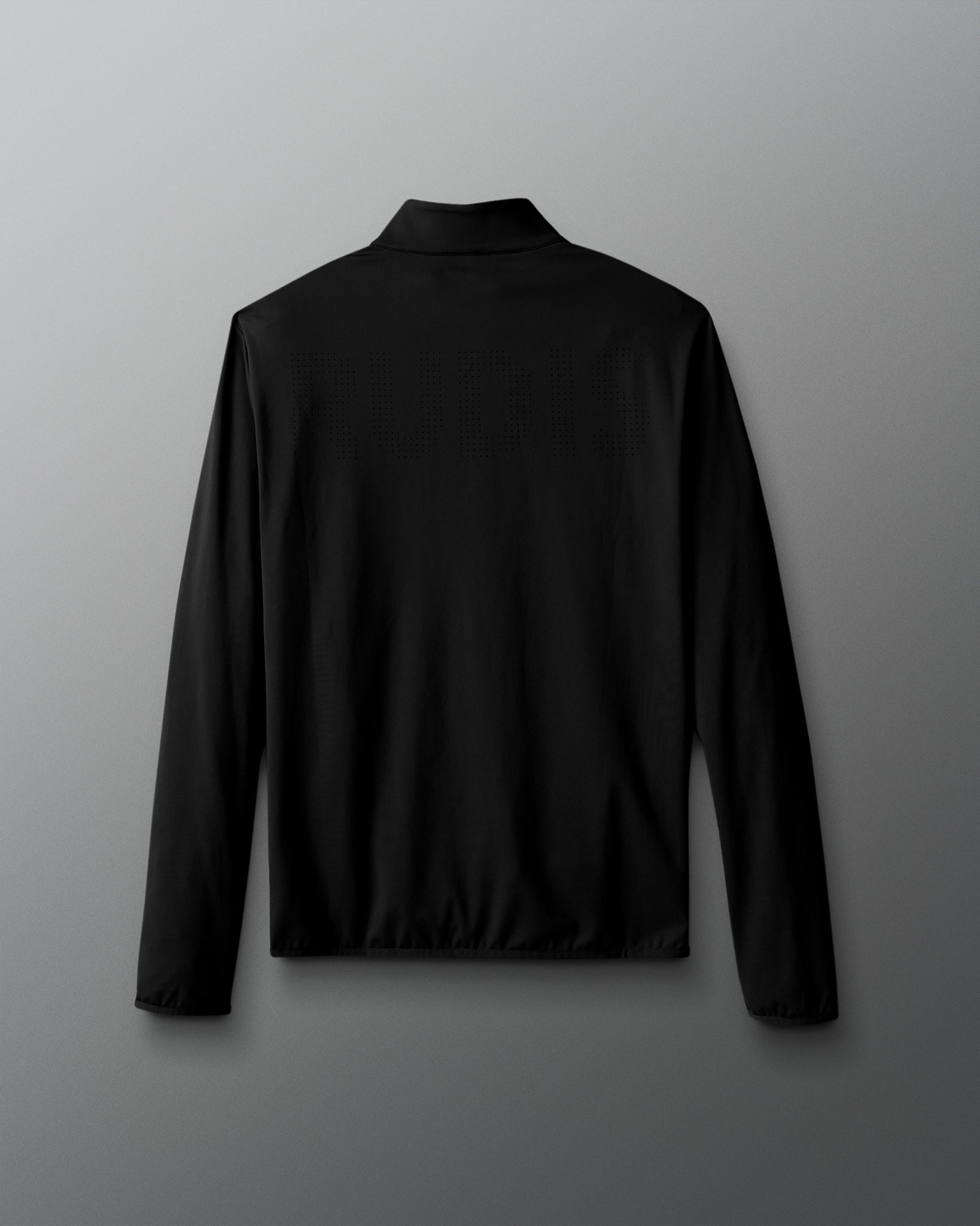 Black long-sleeve shirt on a gray background