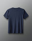Navy blue t-shirt on a light gray background