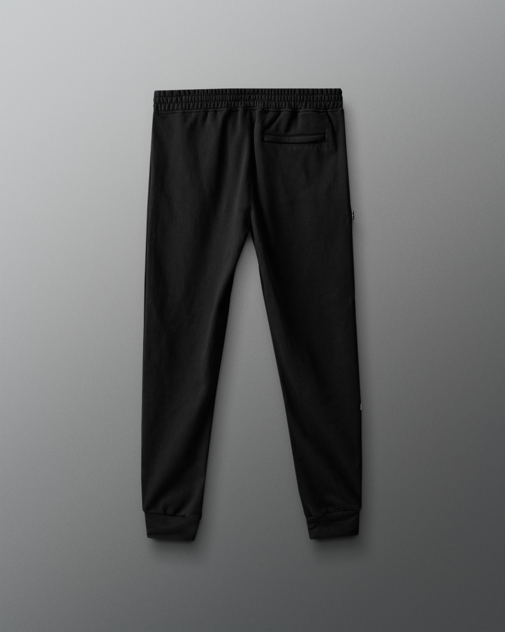 Black pants on a gray background