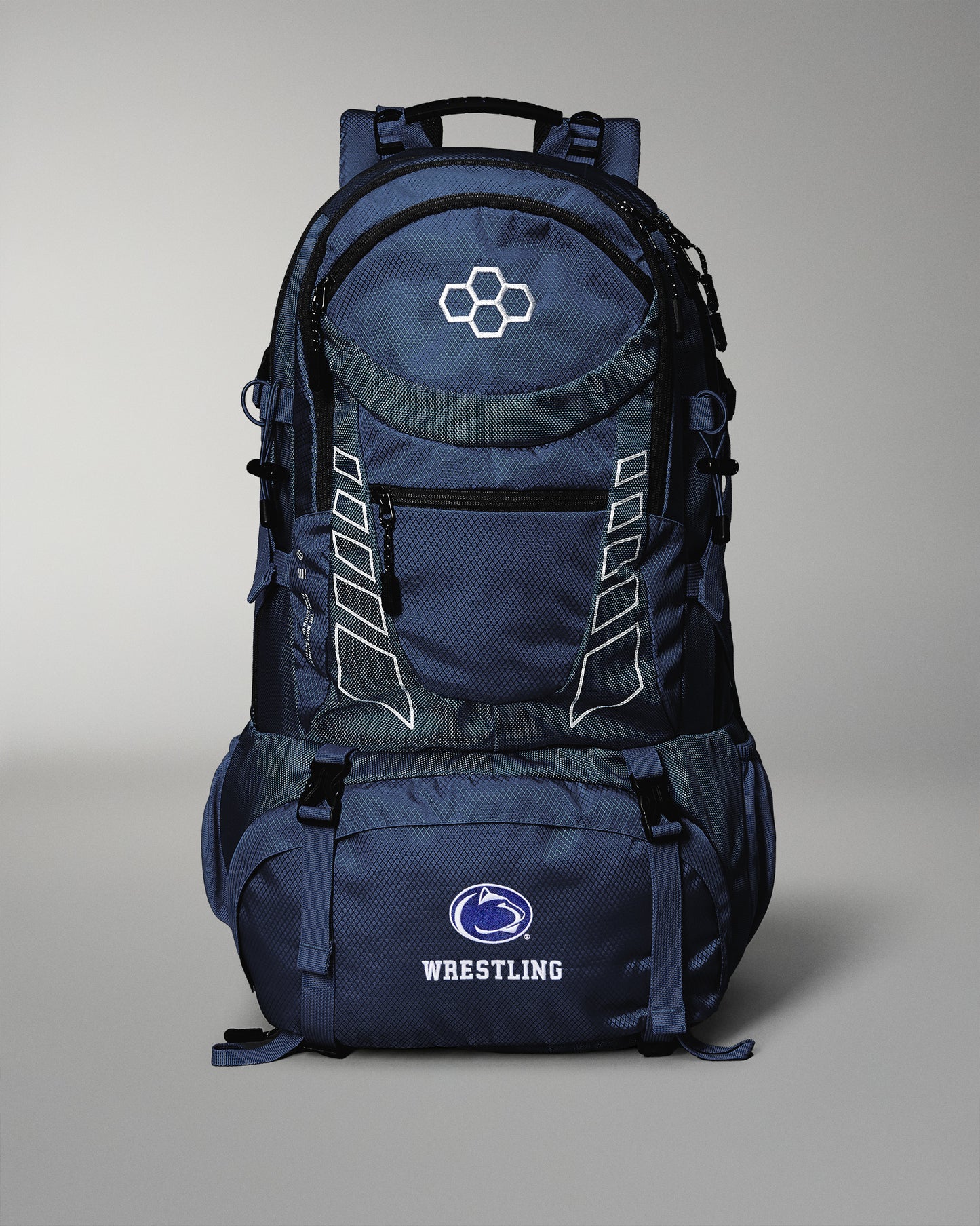 Navy blue backpack with wrestling logo on a gray background