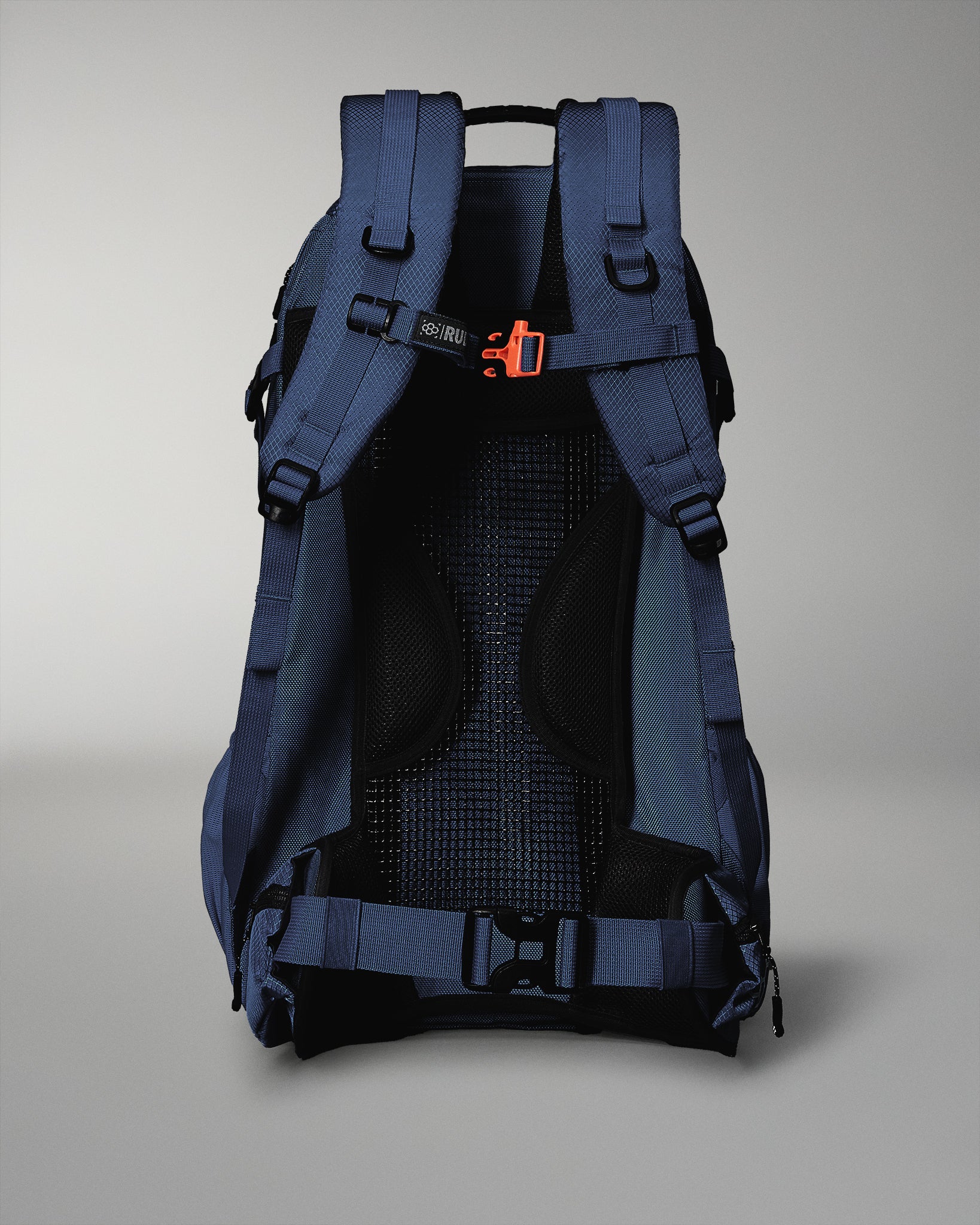 Blue backpack with black interior on a gray background