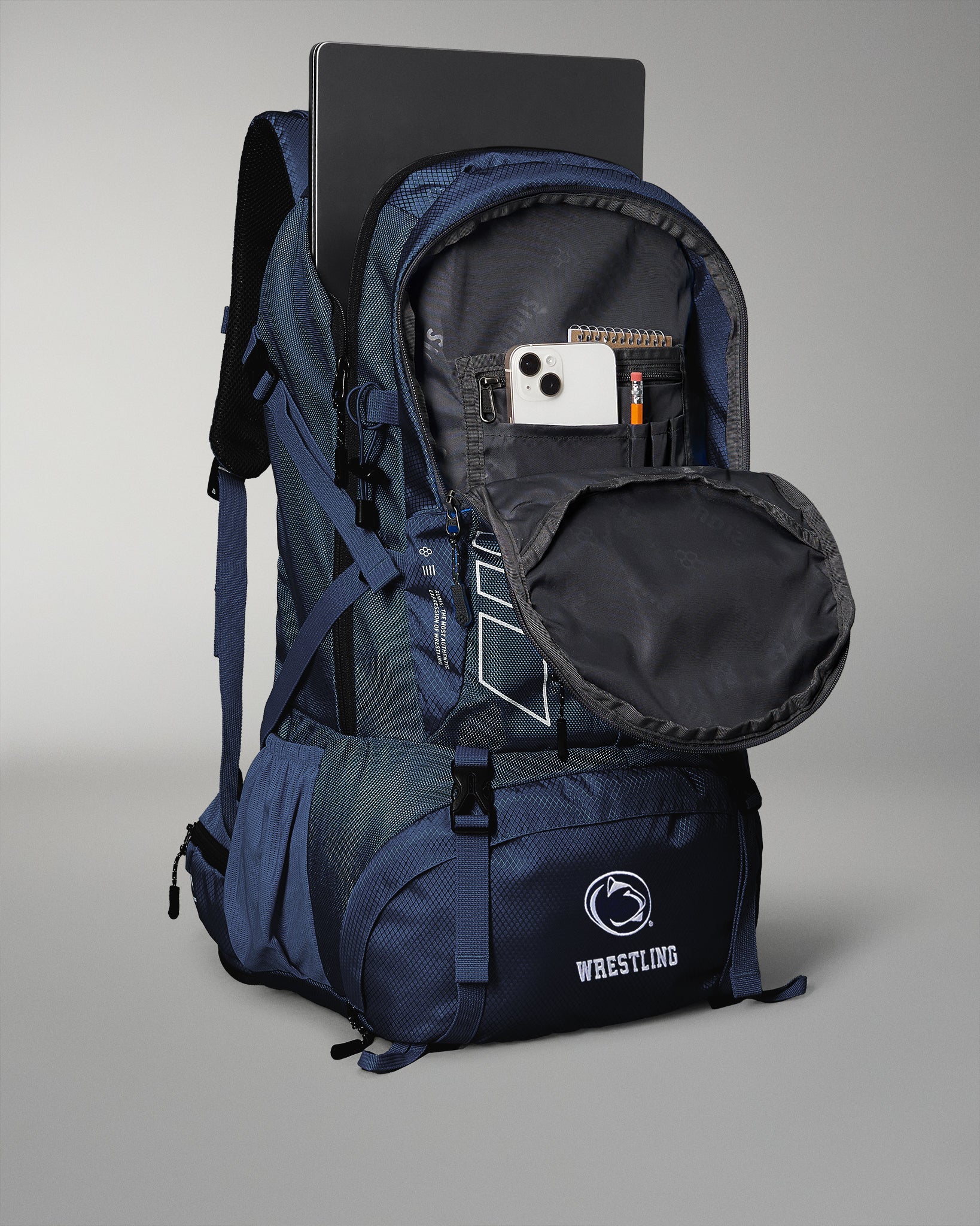 Blue backpack with 'Wrestling' logo on a gray background