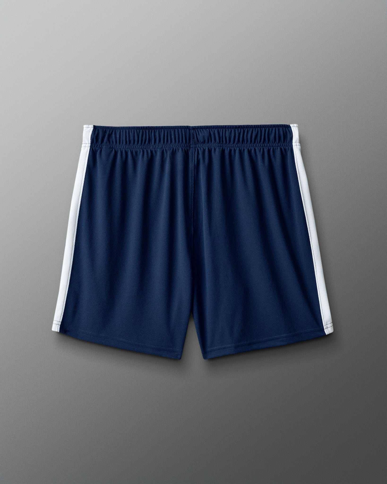 Navy blue shorts with white stripes on a gray background