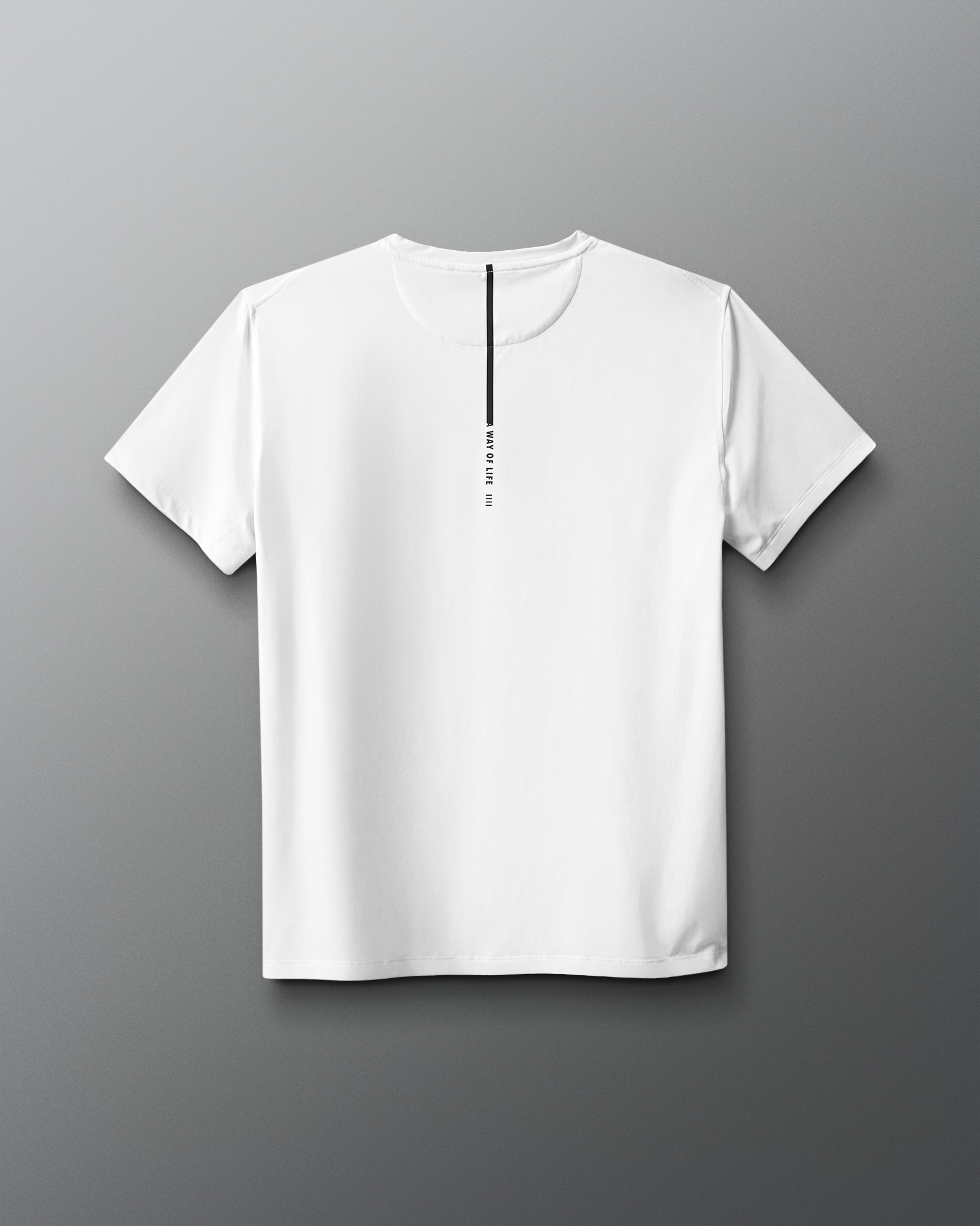 White t-shirt with a small black logo on a gray background