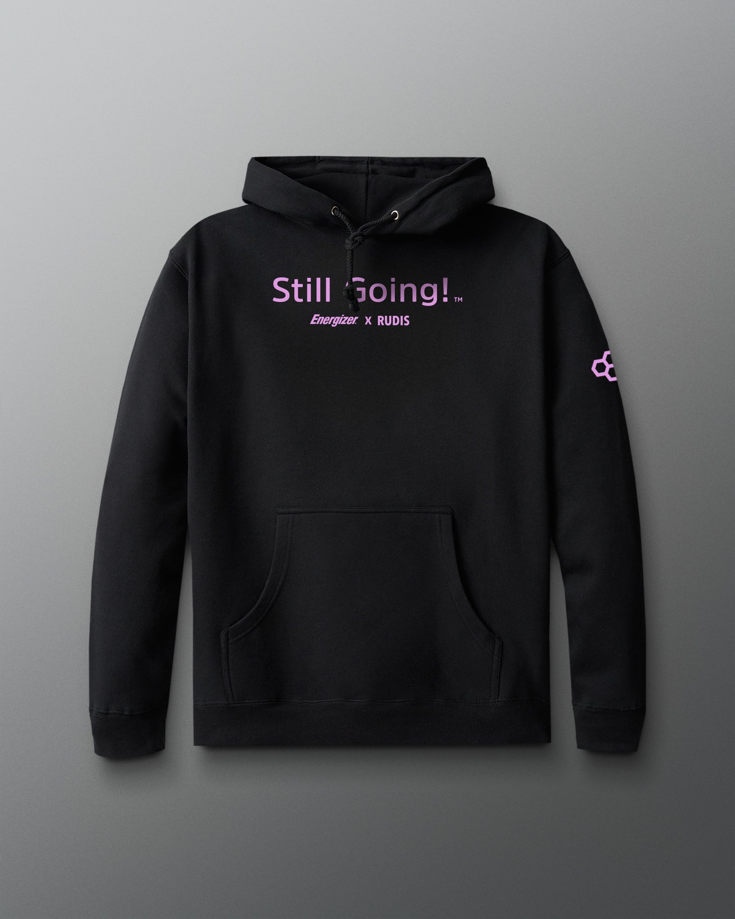 Black hoodie with 'Still Going!' text on a gray background