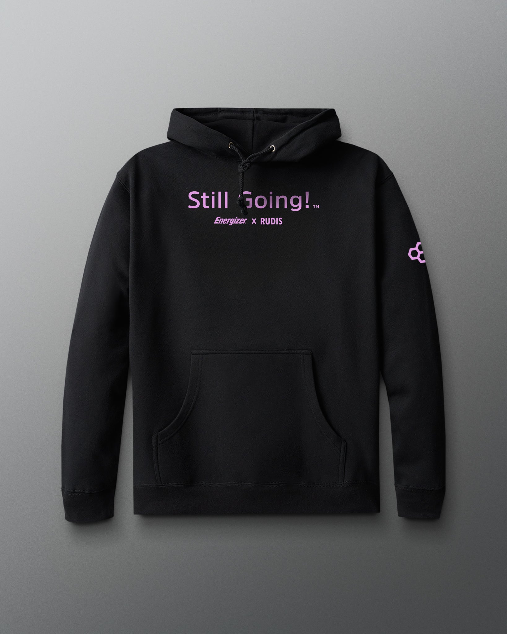 Black hoodie with 'Still Going!' text on a gray background