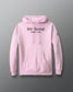 Pink hoodie with 'Still Going!' text on a gray background